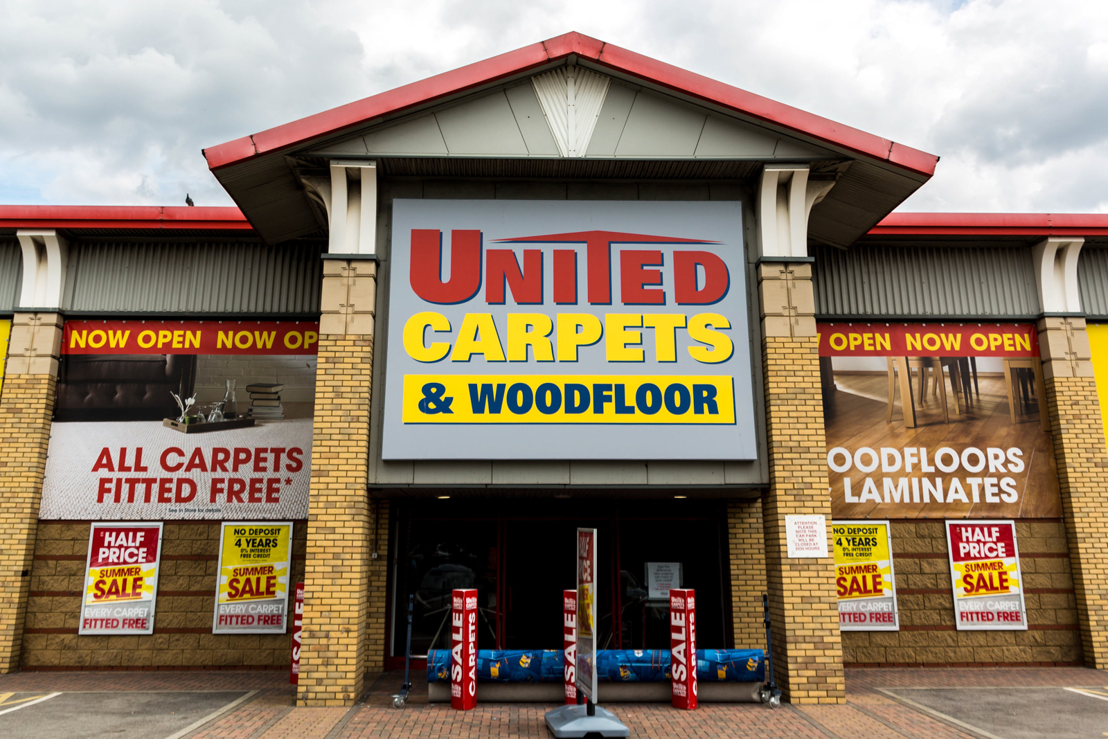 signage - united carpets